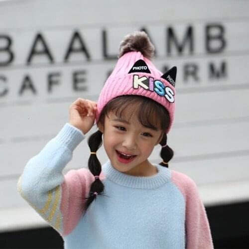 Winter KISS letter big hair ball childrens wool hat Classic explosion men and women baby warm knit hat