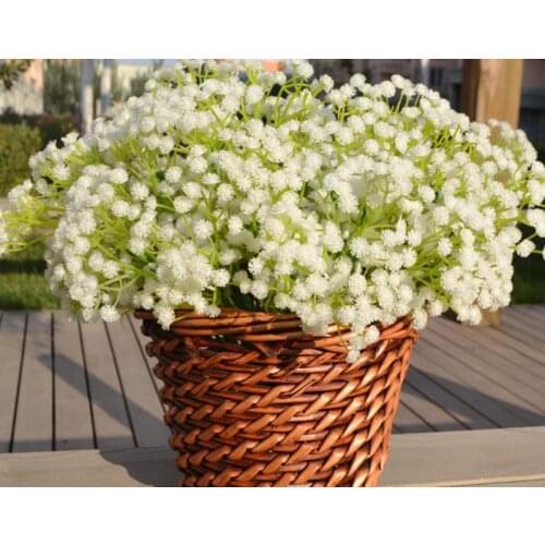 The bride is holding bouquet of stars On the shelves high simulated fake flowers stars home furnishings