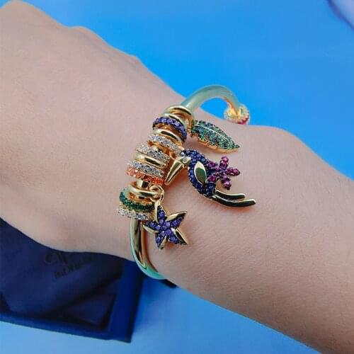 Fashion European and American black cat tropical wind toucan bracelet June new product colorful palm leaf star bracelet ladies a