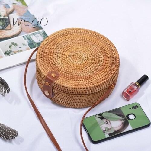 New Rattan ins butterfly paulsen is a vintage artistic brown hand-woven bag with PU flower lining