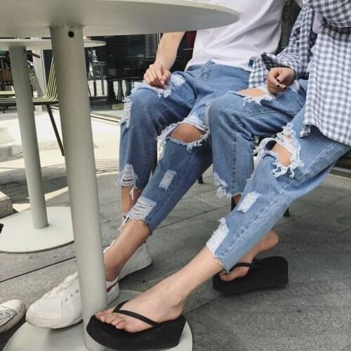Wholesale 2021 Fashion Ripped hole jeans mens raw edge rotten feet pants Korean street hip-hop harem Cropped pants