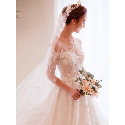 Main wedding dress 2020 new bride wedding floor length v-neck off shoulder long sleeve small tail princess dream girl