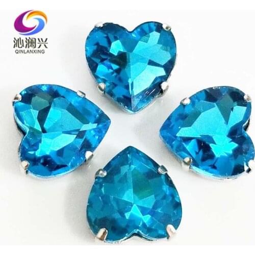 Lake blue heart shape top quality Glass Crystal claw rhinestones,sew on stone with holes for Diy Clothing accessories SWH13