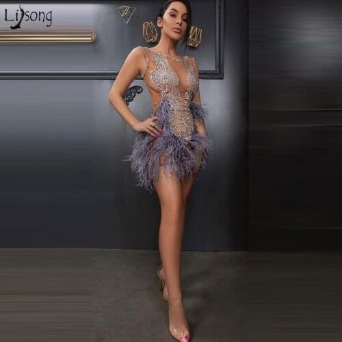 2021 Sexy Mini Cocktail Dresses Short Light Purple Sheer Beaded Feathers Chic Prom Gowns for Girls Sleeveless Homecoming Gowns