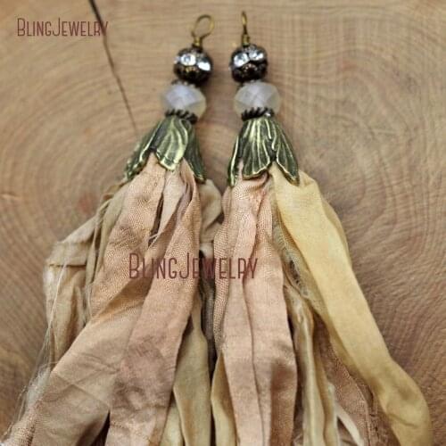 Papaya Whip Sari Silk Tassel Pendant Electroplating Bronze Cap and Matte Crystal Rondelle Accent PM8974