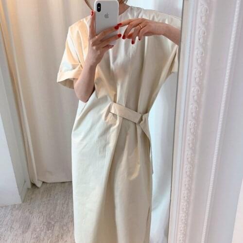 Korean chic niche French round neck design sense side lace-up waist loose solid color long knee-length dress 1010