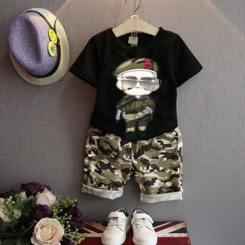 Childrens Suit Summer New Boy Casual Suit Childrens Cotton Glasses Cartoon Shirt T-shirt Camouflage Pants Two-piece