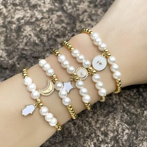 EYIKA Trendy Handmade White Enamel Gold Plated Copper Bead Pearl Elastic Bracelet Moon Star Cross Hamsa Eye Women Charms Bangle