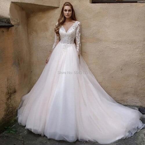 Charming A Line Tulle Wedding Dresses Exquisite Lace Appliques V Neck Long Sleeves Sweep Train Bride Wedding Dress Illusion Back