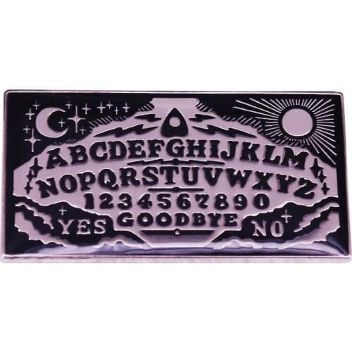 Summon your inner bad gal with our Mysticum Luna ouija board pin