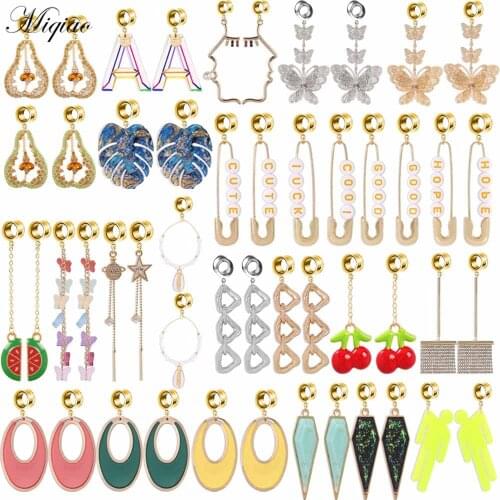 Miqiao 2pcs Fashion Creative Long Diamond-studded Planet Ellipse Butterfly Pear Tassel Ear Amplifying Body Piercing Jewelry