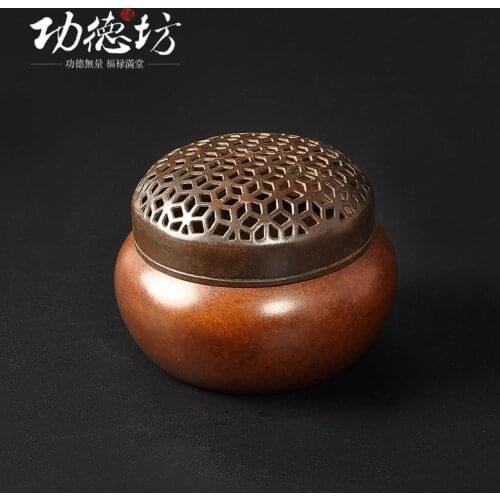 Antique incense burner copper sink sandalwood incense coil furnace oil burner warm hand cone of fragrant red incense and incense