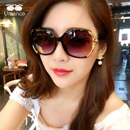 Umanco 2021 New Angled Oversized Flower Decoration Sunglasses For Women Men Fashion Brand PC Frame AC Lens Glasses Beach Gifts