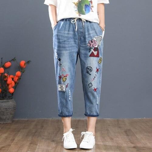 Harajuku Embroidery National Wind Ripped Jeans Woman Print Cartoon Elastic Waist Harem Pants Radish Denim Harem Pants Plus Size