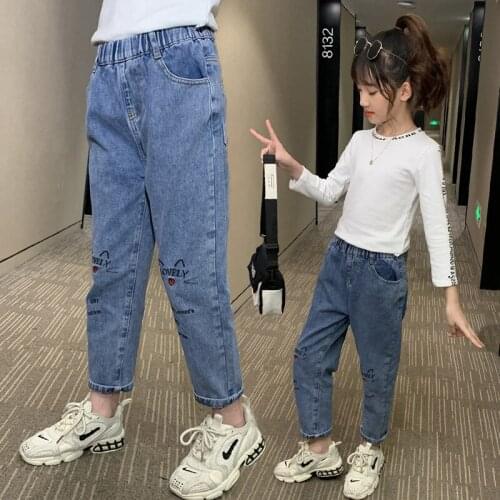 Autumn new girl embroidered jeans foreign trade autumn dress in the big child loose waist cat denim pants