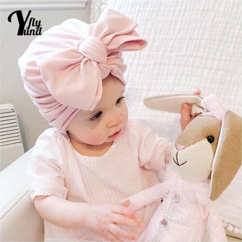 Yundfly Comfortable Breathable Cotton Infant Caps Solid Color Handmade Bowknot Baby Turban Hat Hair Accessories Birthday Gifts