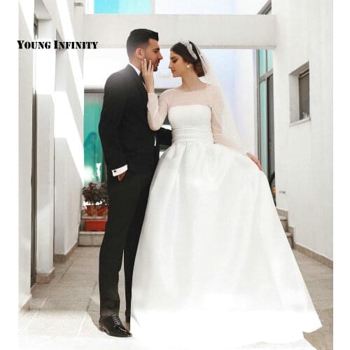 Charming Ball Gown Wedding Dresses 2021 Long Sleeves Bridal Gown Illusion Scoop Sweep Train Simple White Plus Size Bride