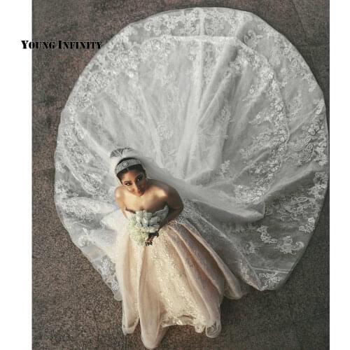 Romantic Ball Gown Wedding Dresses 2021 Sleeveless Bridal Gown Backless Sweetheart Royal Train Applique White Plus Size Bride