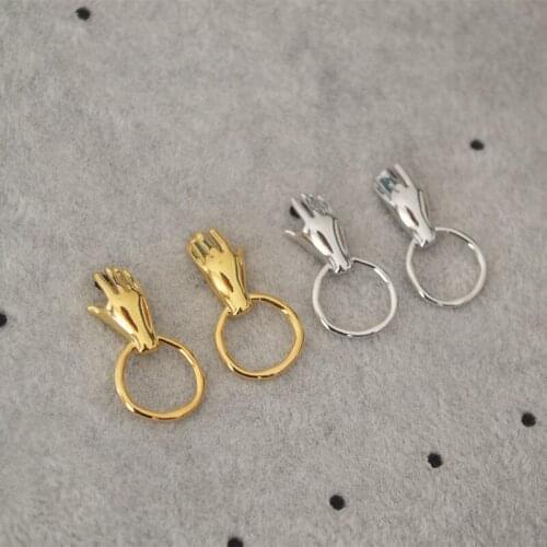 Korean version of the small group creative design palm oath small hand irregular round ring earring earrings