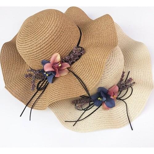 Summer womens outdoor flower straw hat foldable basin hat roll brim wave side bucket hat sun hat beach big brim hat wholesale