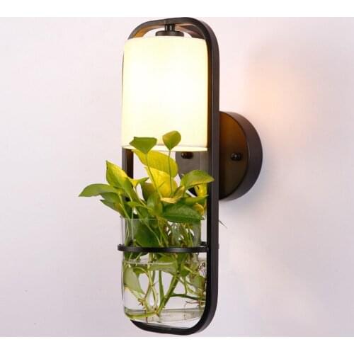 Chinese modern iron plant glass wall lamp