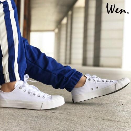 Wen Unisex Skateboarding Shoes Solid White Low Top Canvas Sneakers Athletic Sport Low Heeled Plimsolls Teens Gym Trainers Black
