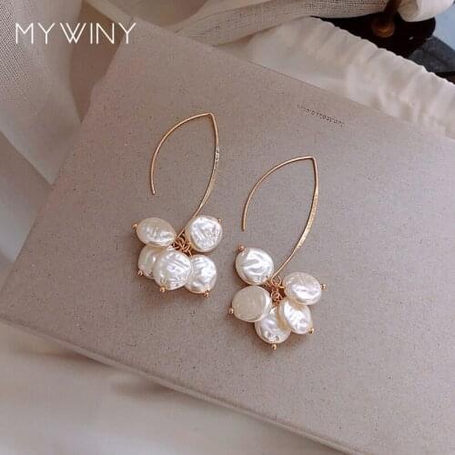 MYWINY Unique Korean ear hook, senior sense shell earrings, temperament ins web celebrity niche earrings for women