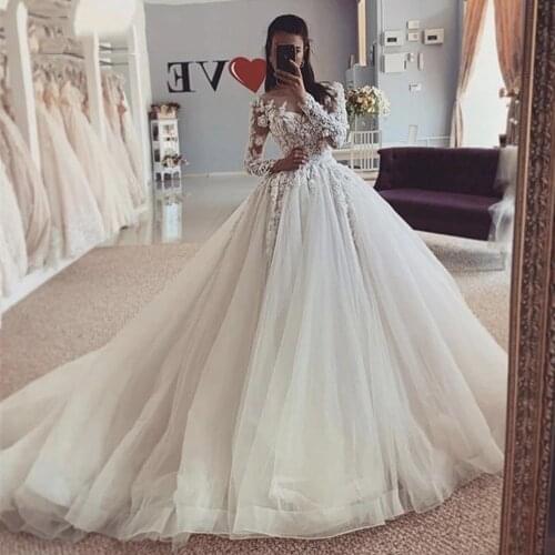 WUZHIYI Spring Ivory Princess A Line Wedding Dresses Long Sleeves Appliques Beaded Illusion Tulle Buttons Back Bridal Gowns 2021