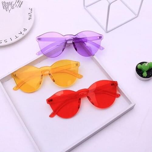 Unique rimless sunglasses women 2021 trending products high quality red yellow violet purple orange frameless oculos feminino