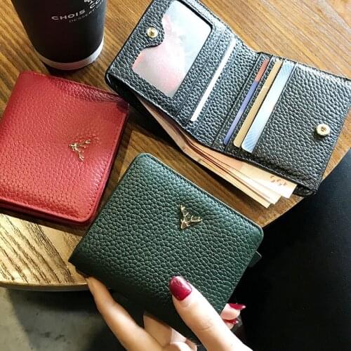 Leather small foldable wallet womens short ultra thin Mini zero wallet Korean new fashion wallet trend