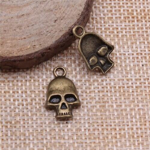 Free shipping 65pcs 16x9mm antique bronze Skull charms diy retro jewelry fit Earring keychain hair card pendant accessories