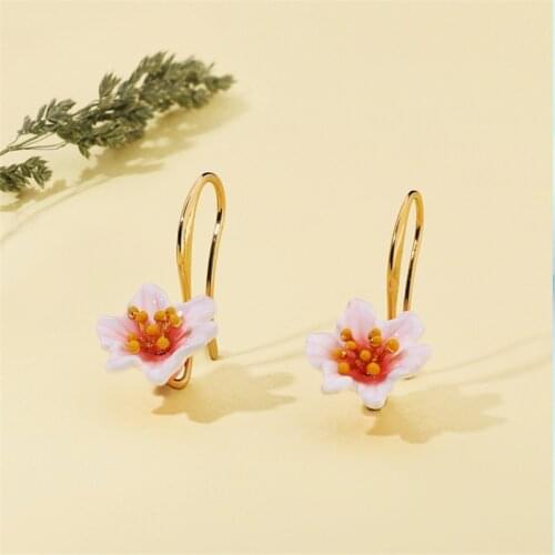 Personality niche hand-painted enamel show face thin earrings Korean temperament simple and fresh flower ear hook earrings