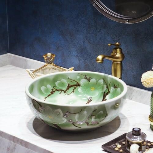 China Artistic Europe Style Counter Top porcelain wash basin bathroom sinks ceramic art hand wash basin