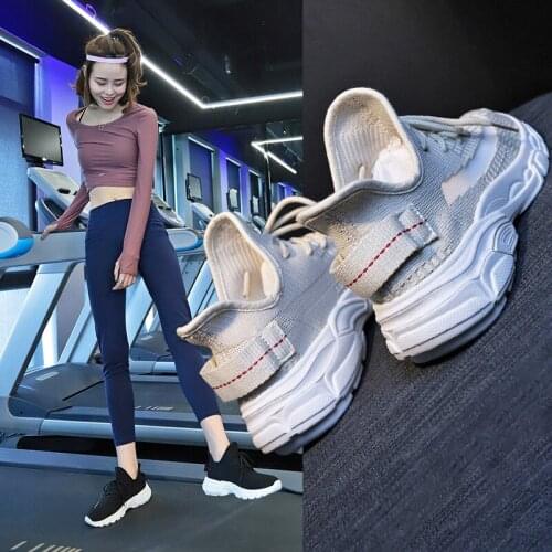 Summer new flying woven sneakers female Korean version of a hundred elastic socks shoes female students breathable white shoes