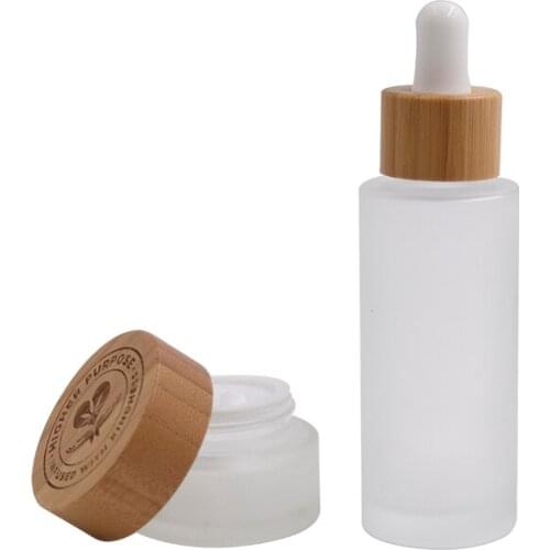 50g luxury empty cosmetic eye cream glass jar with bamboo cap/lids，50g frosted clear face cream cosmetic jar with bamboo cap