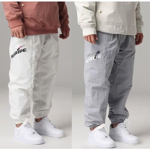 Mens and Womens strapped leg snow snowboard pants waterproof windproof clip cotton thicken warm breathable Korean ski trouser