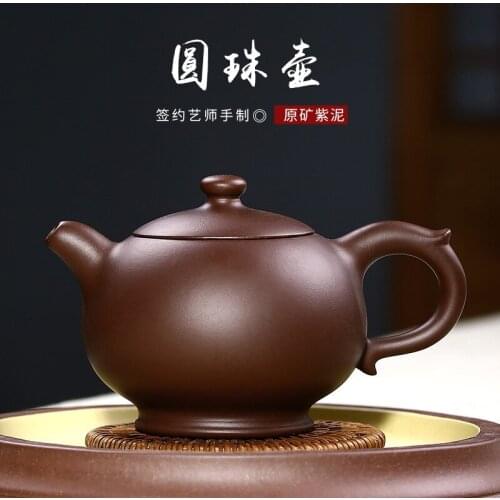 Wholesales Yixing original mine Purple mud round bead pot low grade manual purple sand tea set grouting locomotive pot