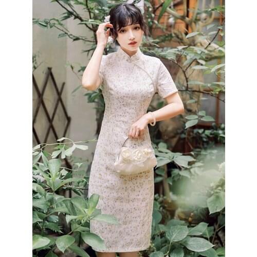 Original scene shooting spot champagne of improved qipao dress pricing