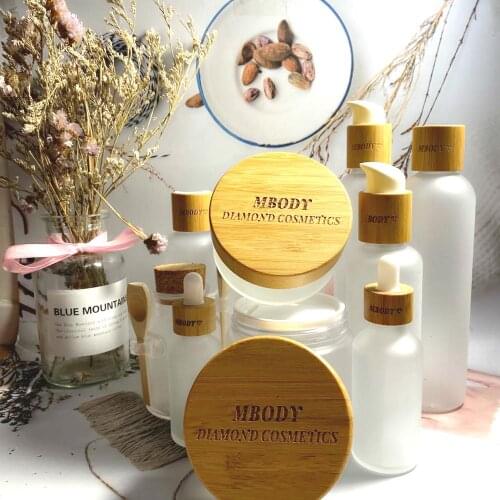 Lotion Shampoo Frosted Clear Glass Jar With Bamboo Lid 30ml 50ml 100ml 120ml 150ml Spray Bottle Glass Engraving Logo Pump Bottle