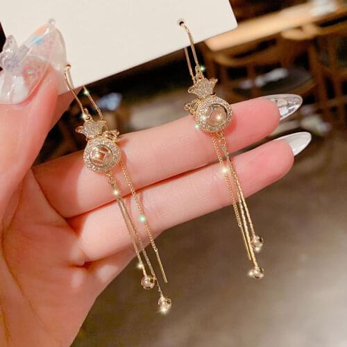 Chinese style 2021 new hollow wallet ear line trend Korean style fashion earrings long tassel earrings gift ladies jewelry