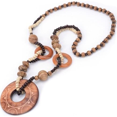 Magic Sun lines Hand Carved Exotic Hollow Round Woody Beaded Pendant Necklace Fashion Jewelry for Women Birthday Present Gifts