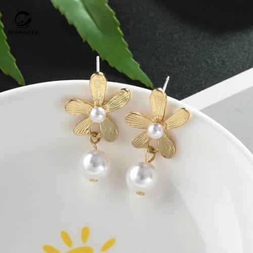 Tibetan Silver needle Korea Dongdaemun small daisy pearl earrings Girl heart temperament wild flower earrings Free shipping 163