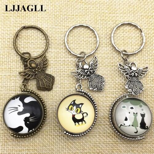 LJJAGLL Trendy Keychain Rotation Double Side Cabochon Pendant Yin Yang Cats Key Chain Angel Cat Cute Jewelry Findings