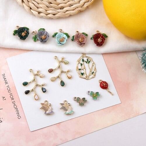 Min order 20pcs/lot alloy drop oil cartoon camellia/flower/swan shape metal floating locket charms diy jewelry pendant accessory