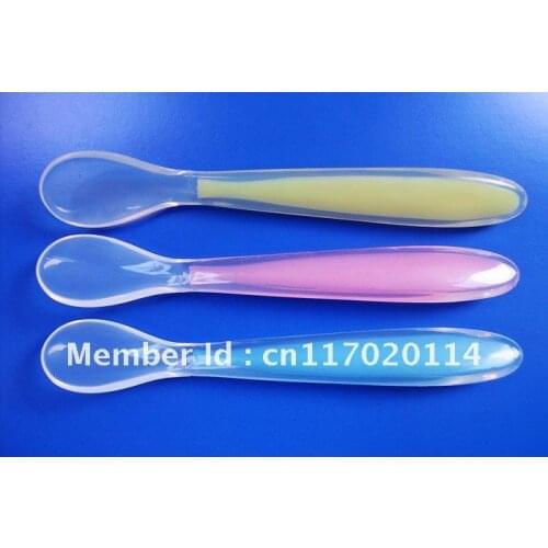Wholesale) DHL 50pcs New Soft Silicone Baby Feeding Spoons Silicone Baby Spoons