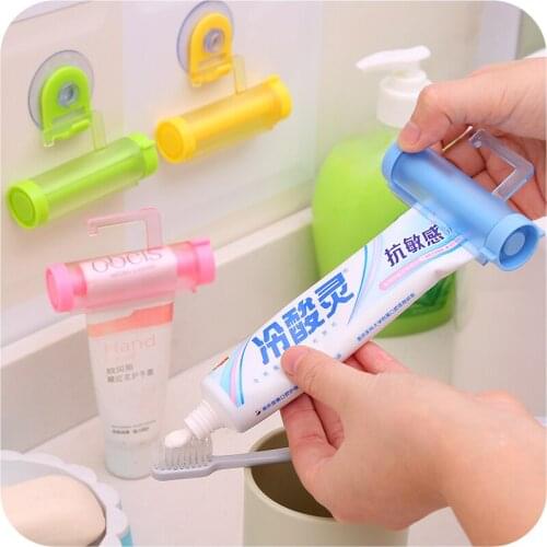 2pcs Creative manually toothpaste dispenser Rolling toothpaste squeezer Tube Partner Sucker Hanging Holder bathroom accessories