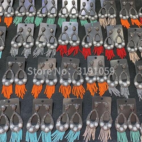 European and American fashion new hollow-out pearl crystal tassel earrings