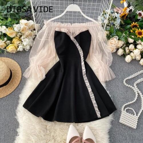 Temperament beach mesh gauze bubble sleeve stitching super fairy dress 2020 spring and summer seaside holiday model