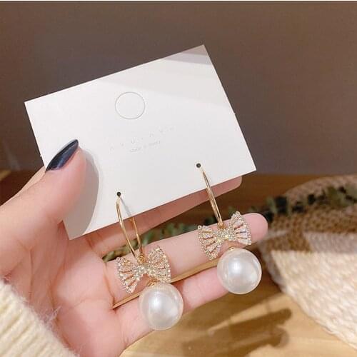 Sweet Girl Earrings Fashion New Temperament Super Fairy Crystal Bow Pearls Wild Net Red Womens Earrings Wholesale Pendientes