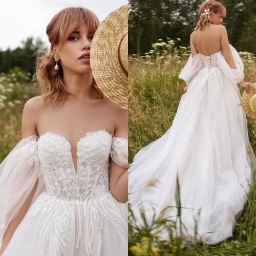 Off Shoulder Sweetheart Wedding Dresses 2021 A-Line Lace Appliques Strapless Sweep Train Princess Bridal Gown Tulle Backless